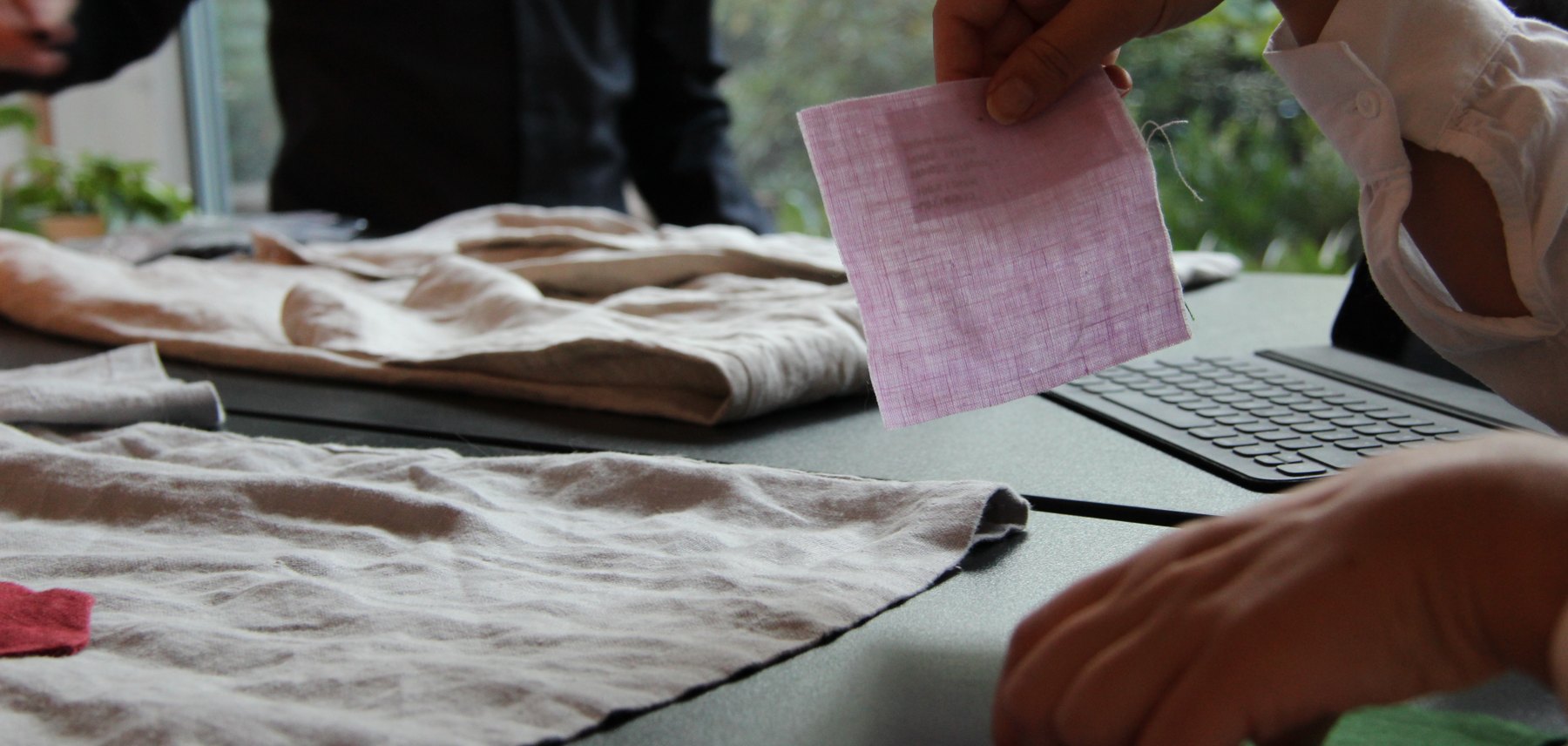 Reviewing linen swatches at HACOY
